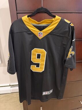 NFL New Orleans Saints Black and Gold Drew Brees #9 Jersey. Size Medium.